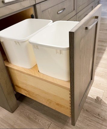 Built-in waste storage compartments