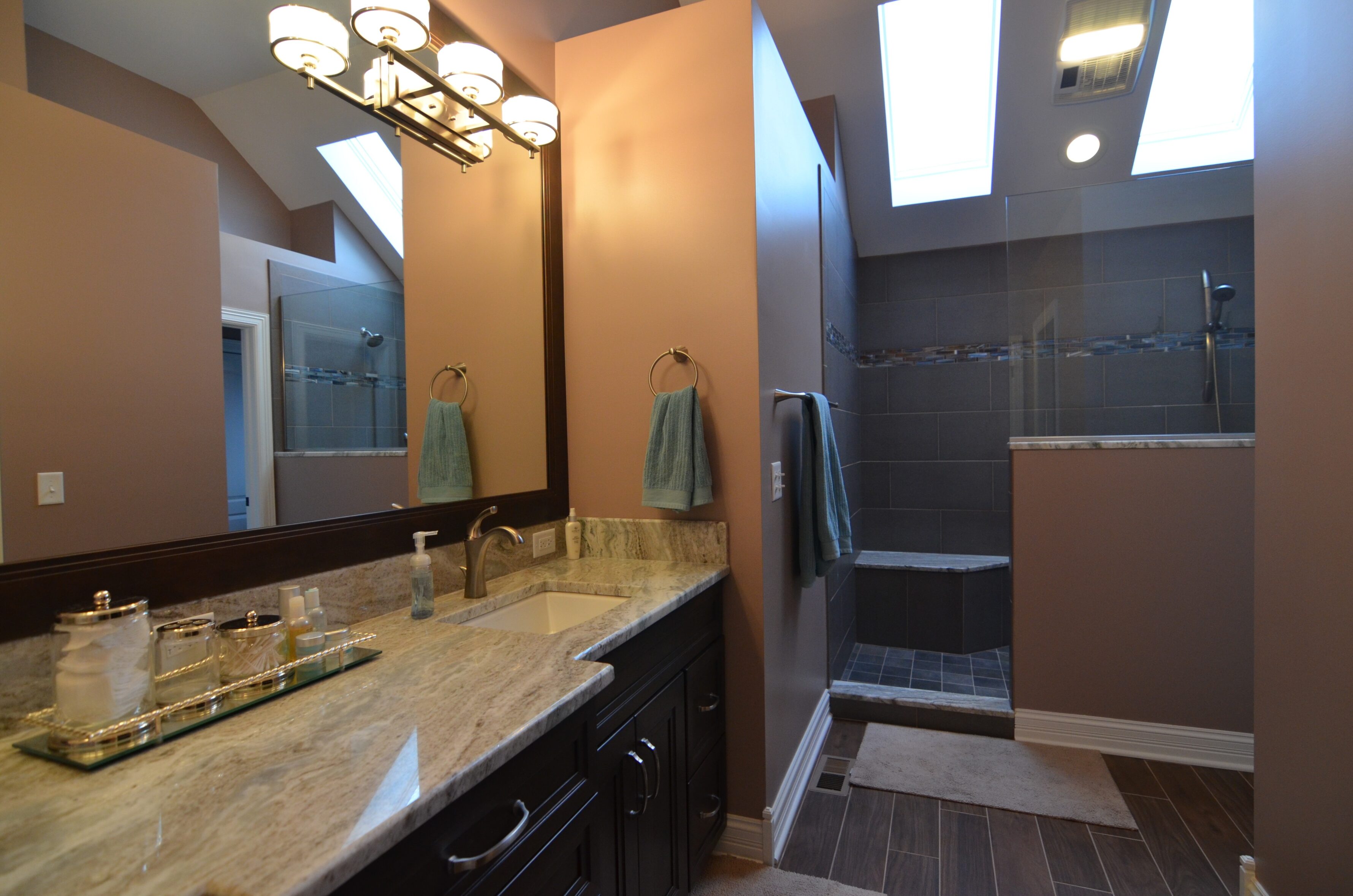Bathroom remodeling in Naperville, IL. New wood tile bathroom flooring for warm tones.