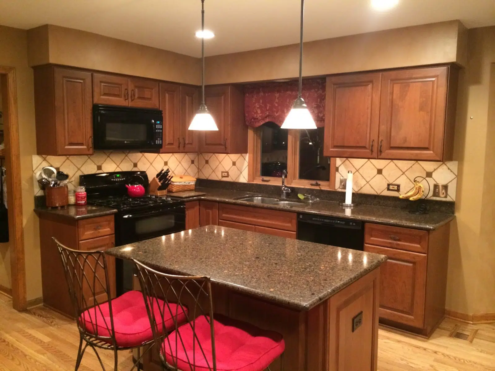 Kitchen with island, appliances, cabinets and drawers