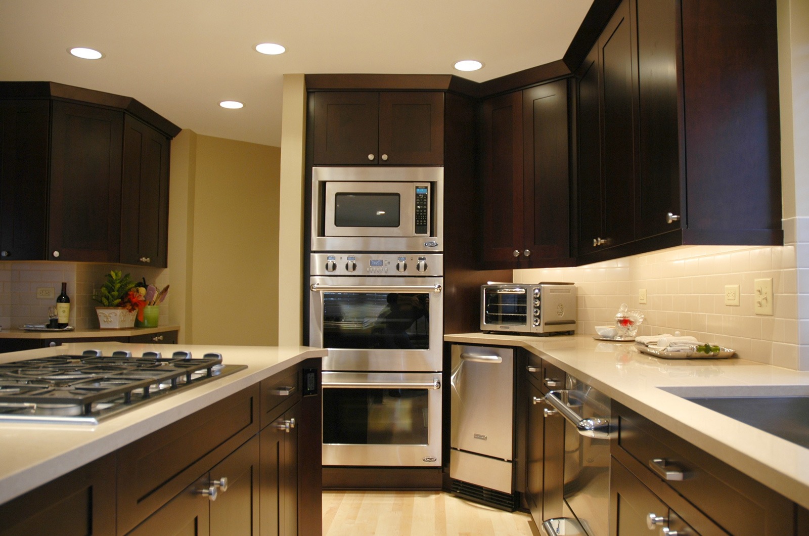 Kitchen remodeling in Naperville, IL. Microwave and oven placed together to maximize storage.