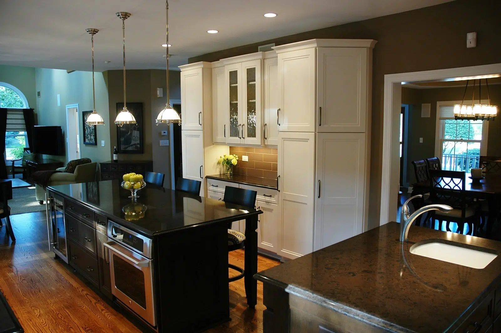 A custom kitchen with a removed wall to create open space