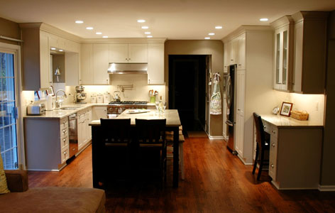 Kitchen remodeling in Naperville, IL. White shaker kitchen doors with dark island.