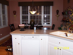 Sink and dinette view before kitchen remodeling.