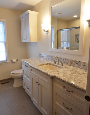 Bathroom remodeling in Naperville, IL. Transitional bath with painted cabinets & quartz counters.