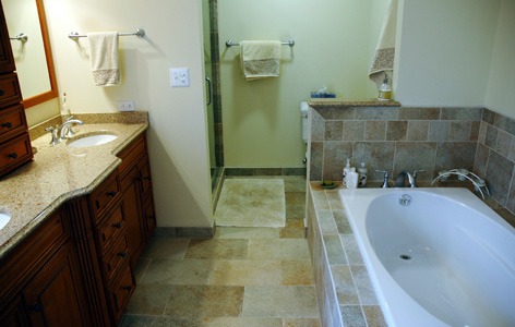 the kitchen master bathroom before & after tub surrounded by stone closed shower