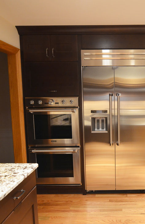 Kitchen remodeling in Naperville, IL. Custom tall cabinet with a double oven microwave.