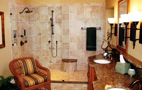 Bathroom with glass shower two showerheads stone vanity black upward pendant lighting