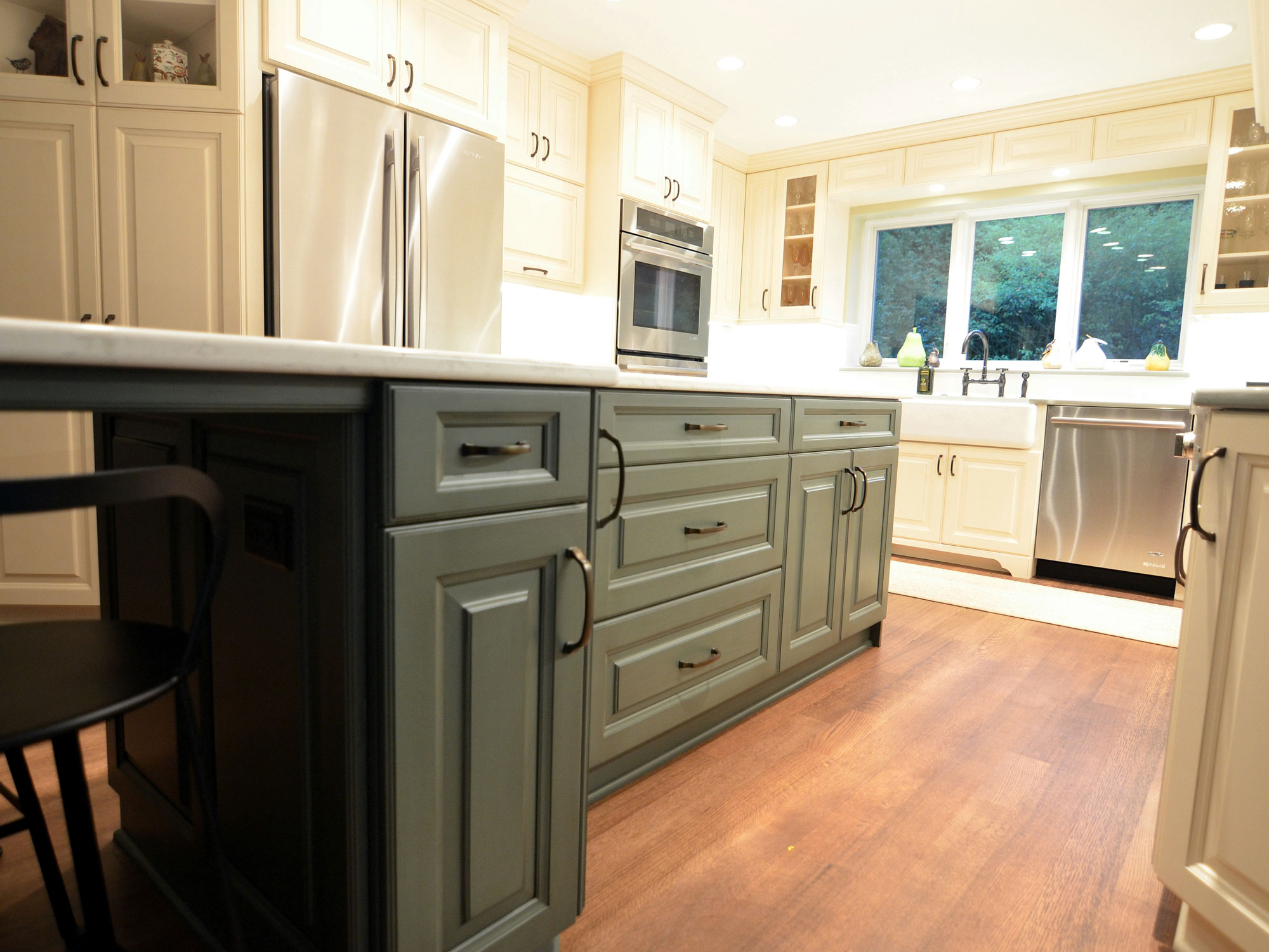 Kitchen remodeling in Naperville, IL. Custom green island design in home kitchen.