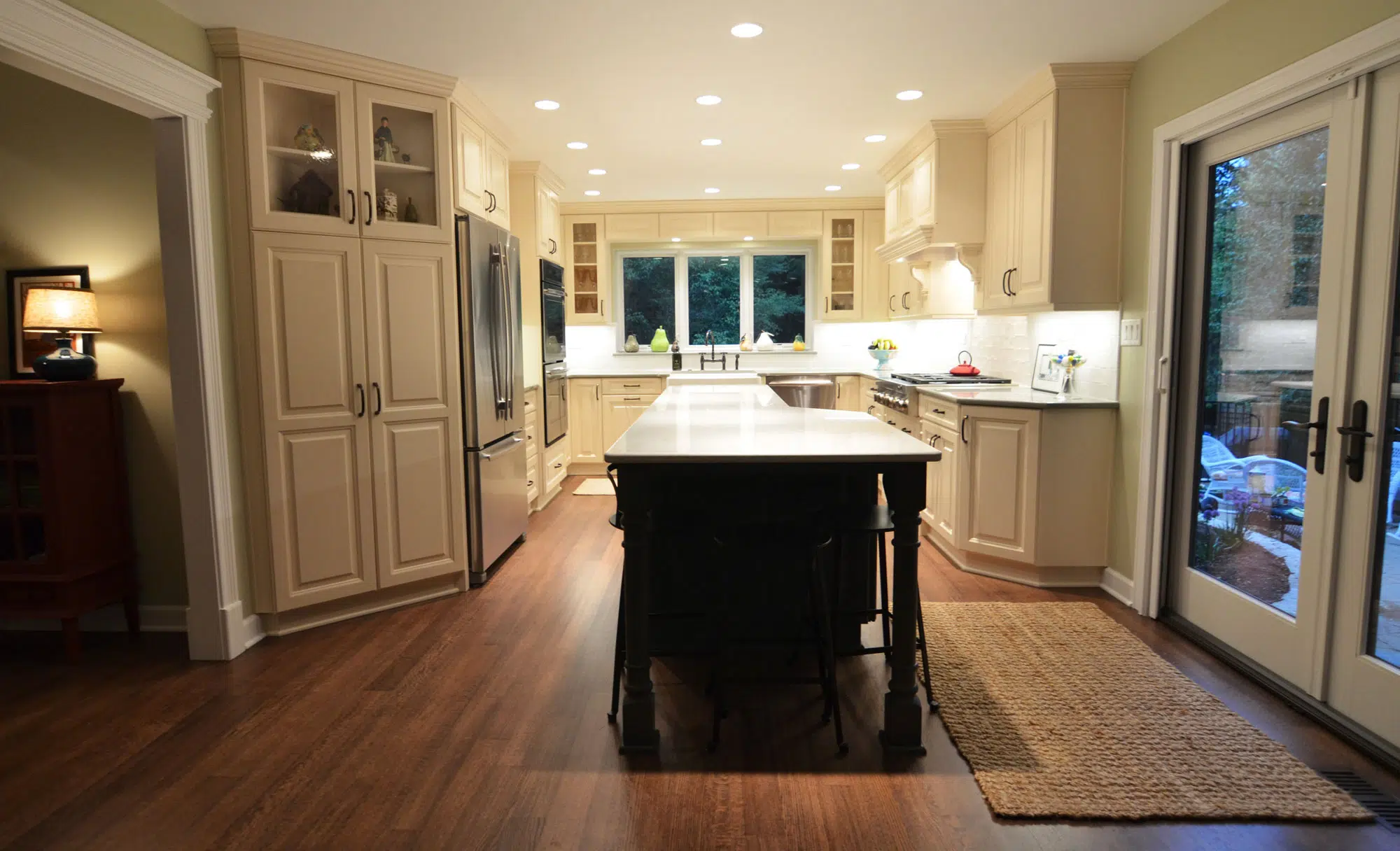 Kitchen remodeling in Naperville, IL. Custom green island after kitchen renovation.