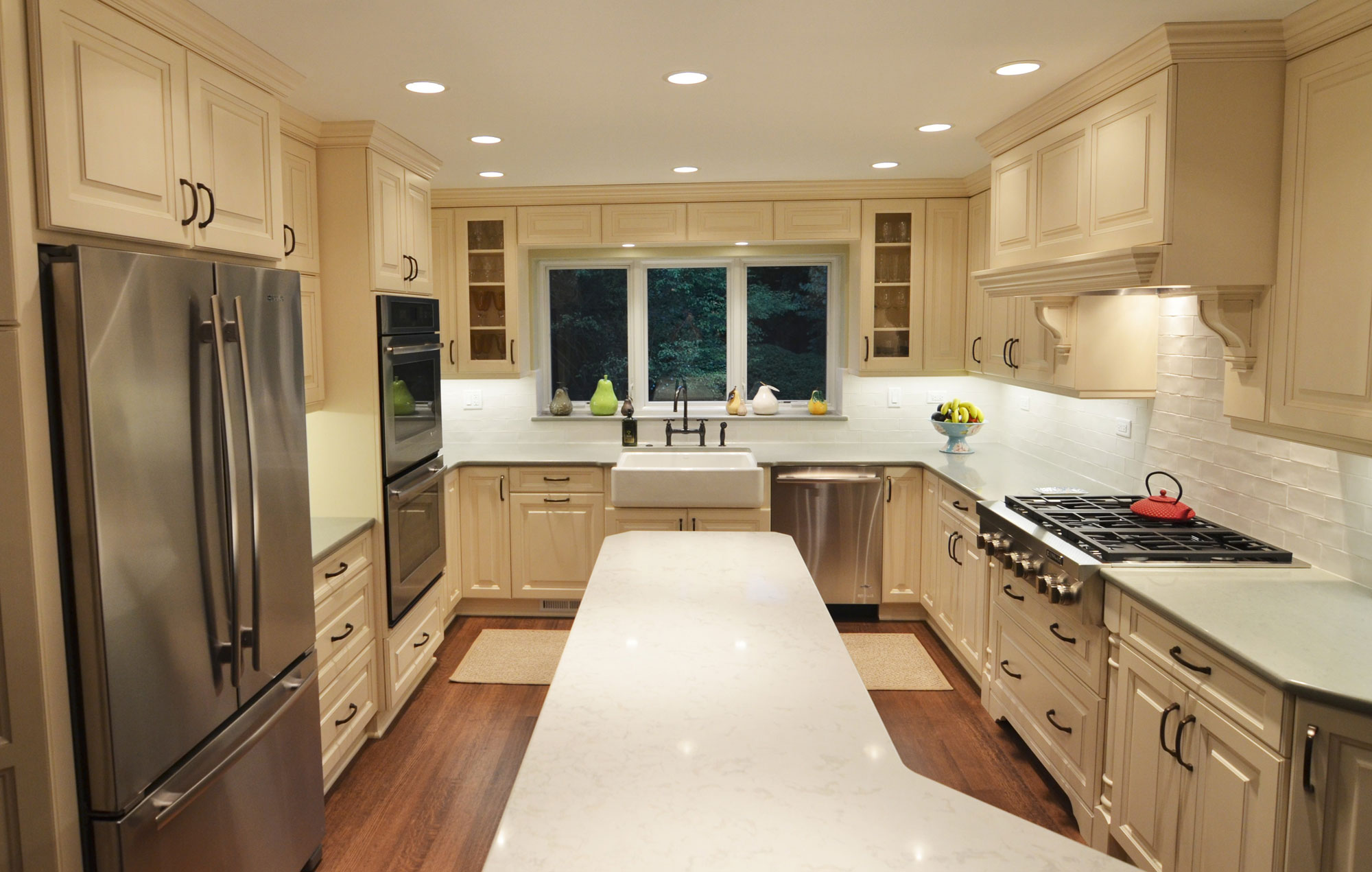 Kitchen remodeling in Naperville, IL. Green island design in traditional home kitchen.