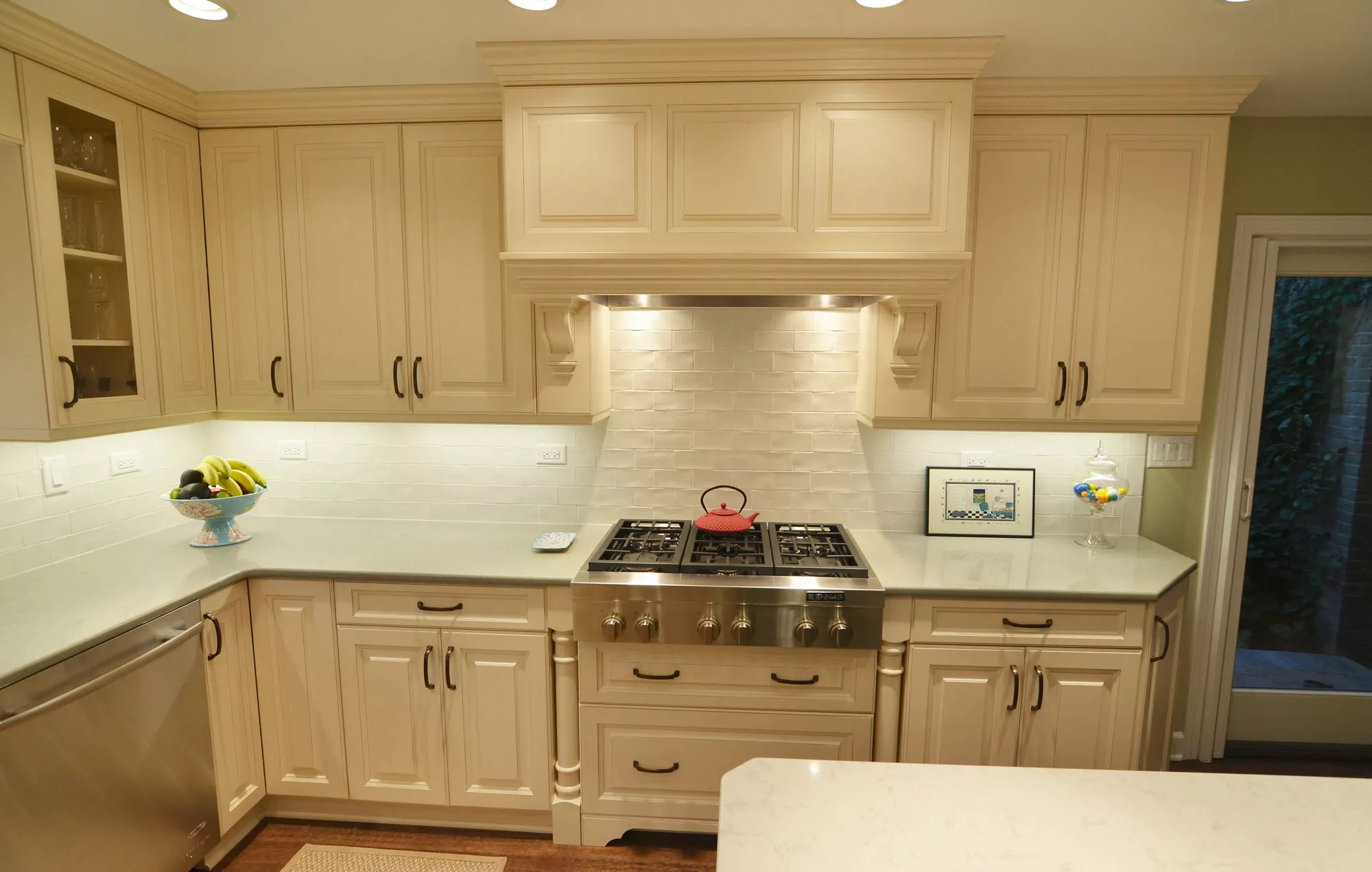 Kitchen remodeling in Naperville, IL. New kitchen stove area and redone counters and cabinets.