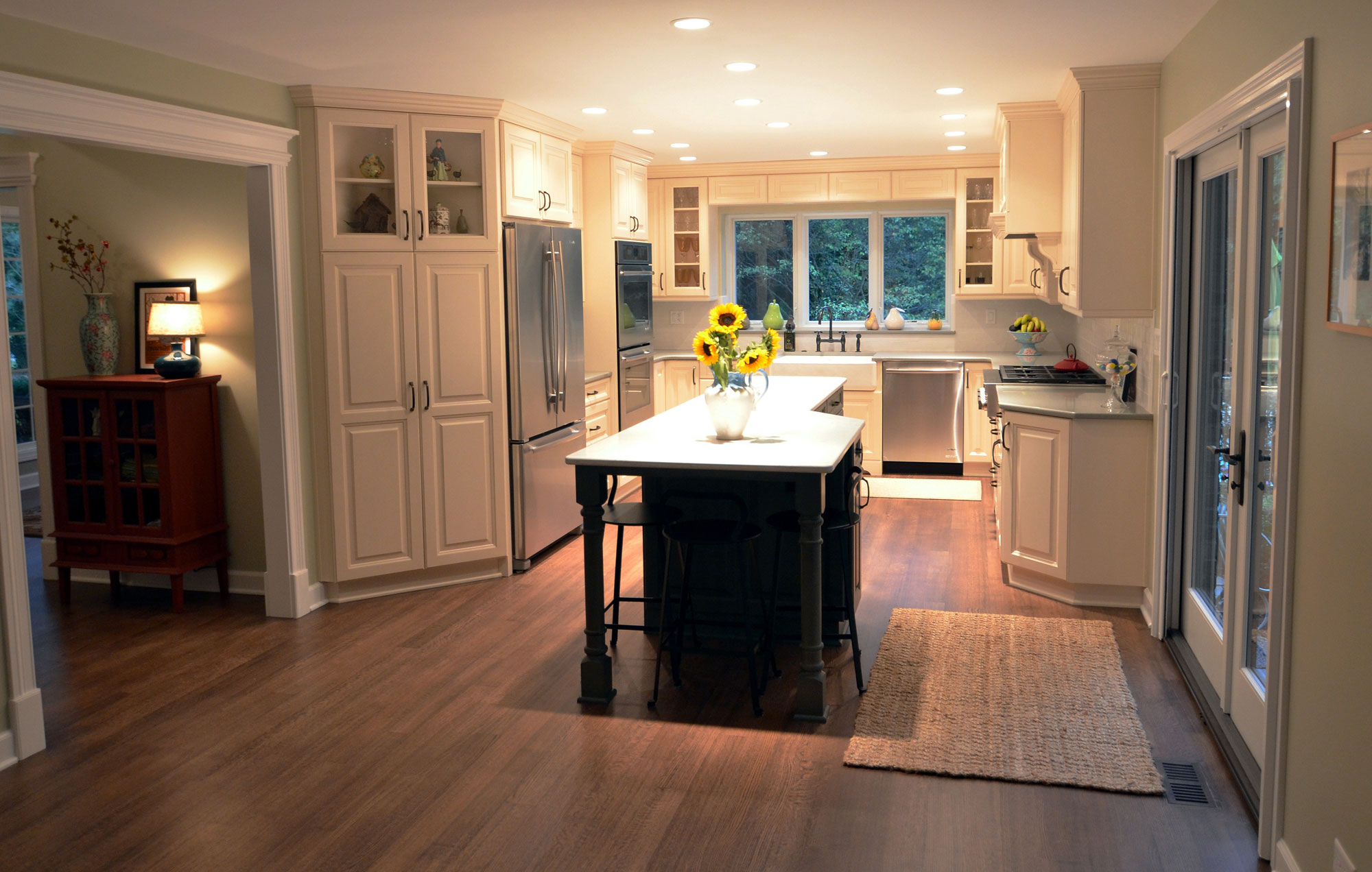 Kitchen remodeling in Naperville, IL. Kitchen island with decorative sunflowers after redesign.