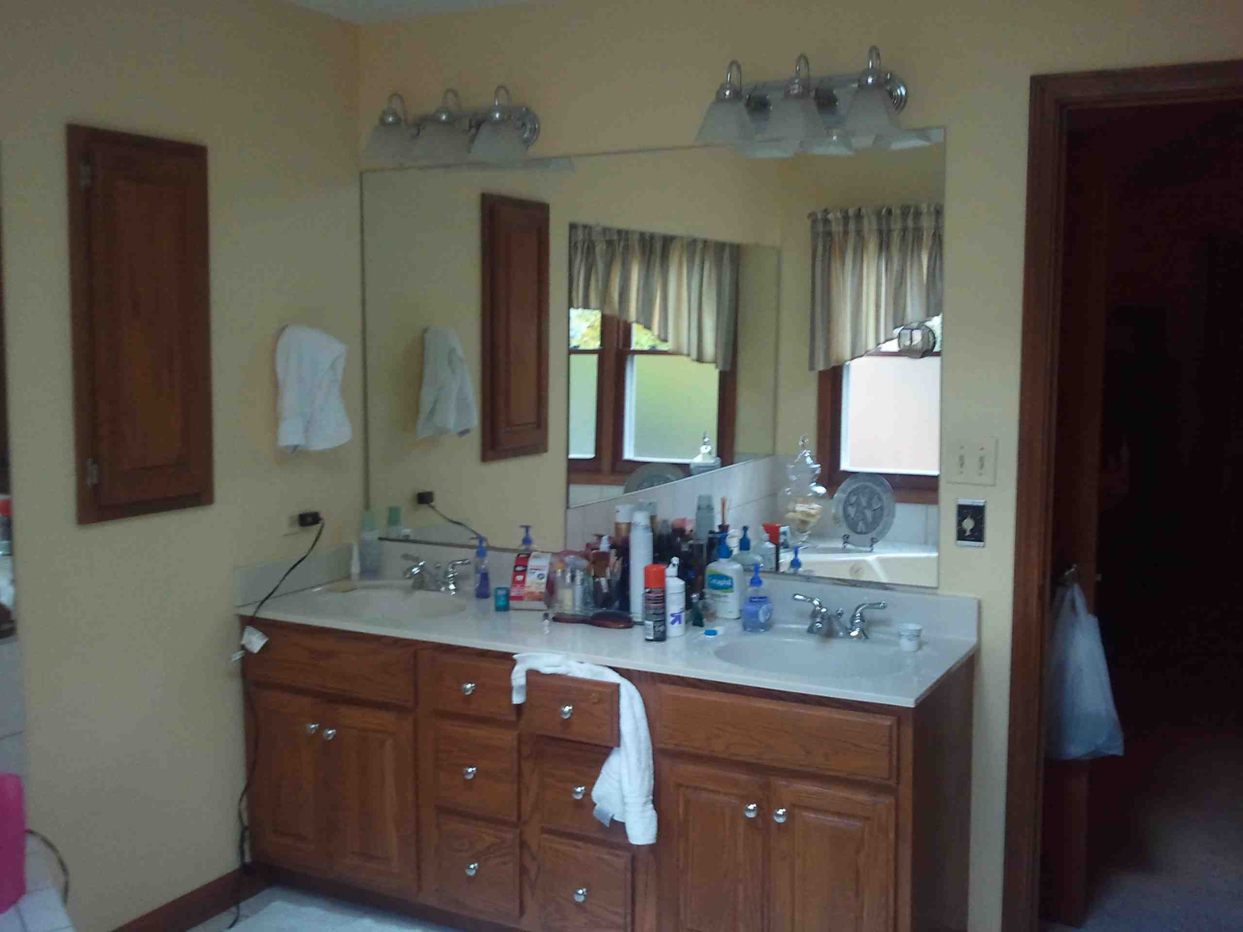 before the kitchen master bathroom renovation with cluttered double vanity small mirror