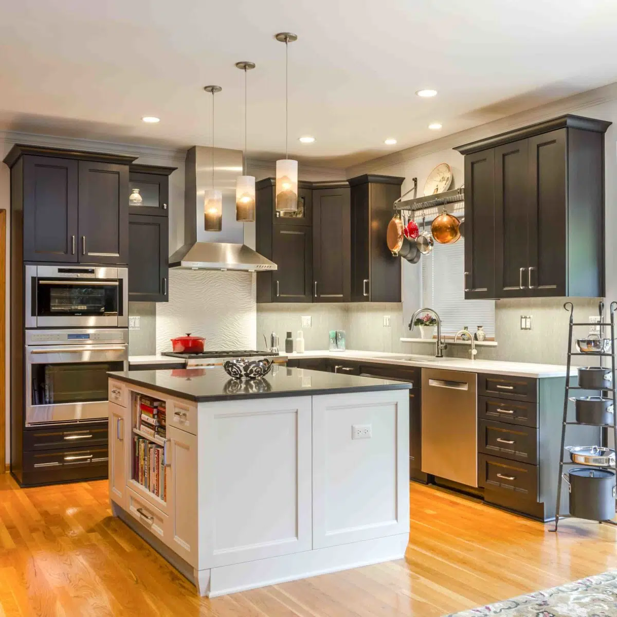 the kitchen master renovation black overhead cabinets double oven white square island