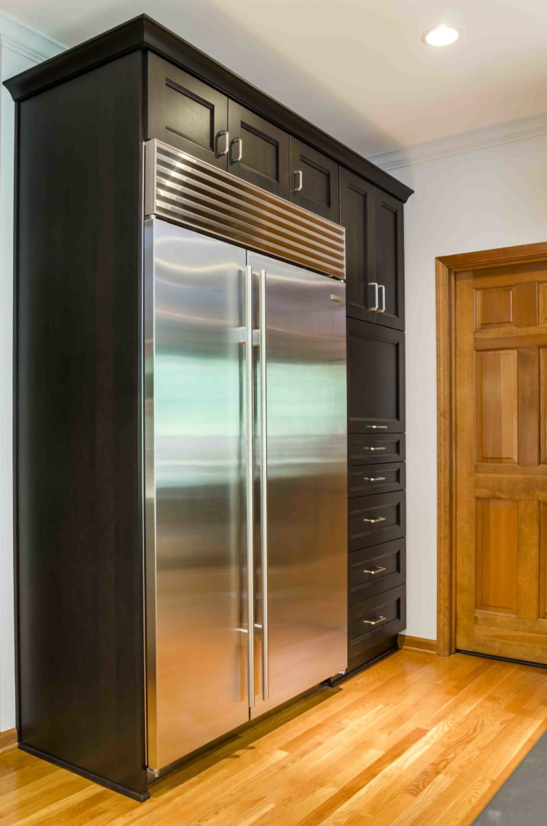 the kitchen master remodel large stainless steel fridge deep brown countertops hardwood floors