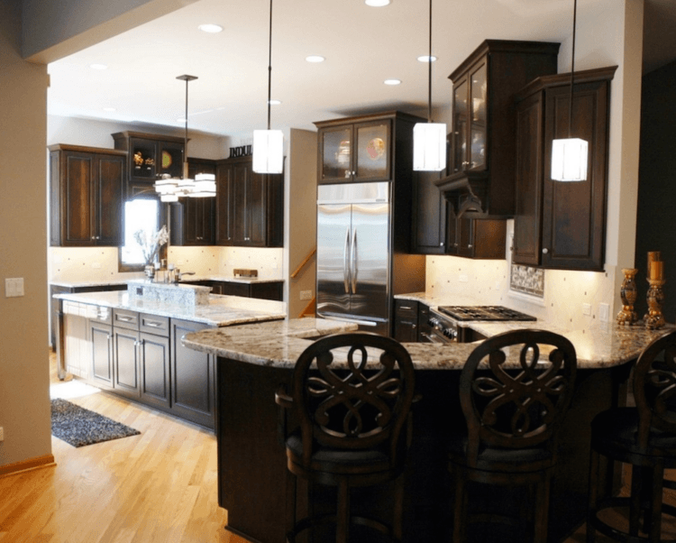 the kitchen master kitchen remodel dark cabinetry recess lighting hardwood flooring