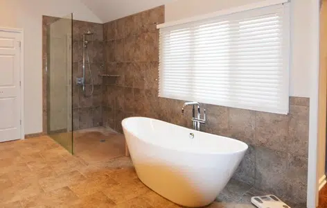 Curbless walk in shower with garden tub and open glass door the kitchen master