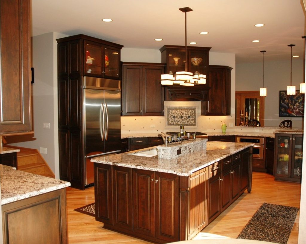 contemporary kitchen renovation deep wood cabinetry light hardwood floor stainless steel appliance