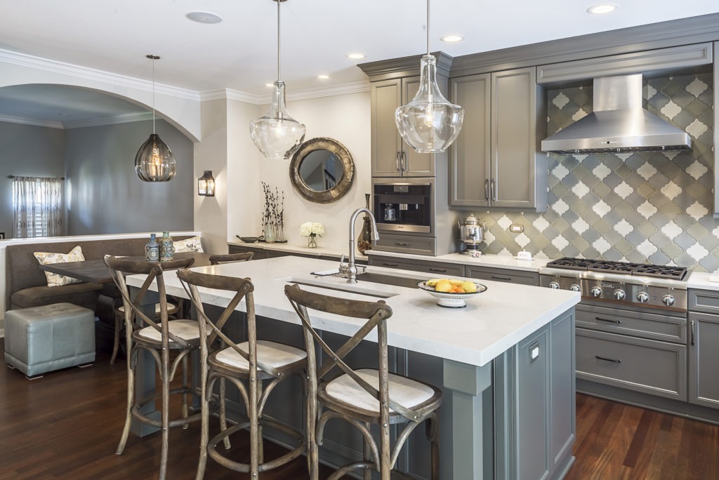 the kitchen master grey & white renovation geometric backsplash hooded vent island & dining seating