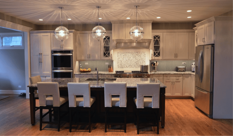 elegang kitchen remodel globe pendant lighting over granite island white cabinetry stainless steel