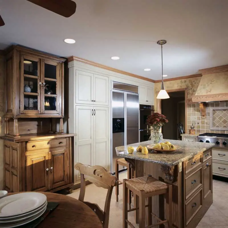 the kitchen master after kitchen renodel two tone cabinetry small island hooded vent recess lighting