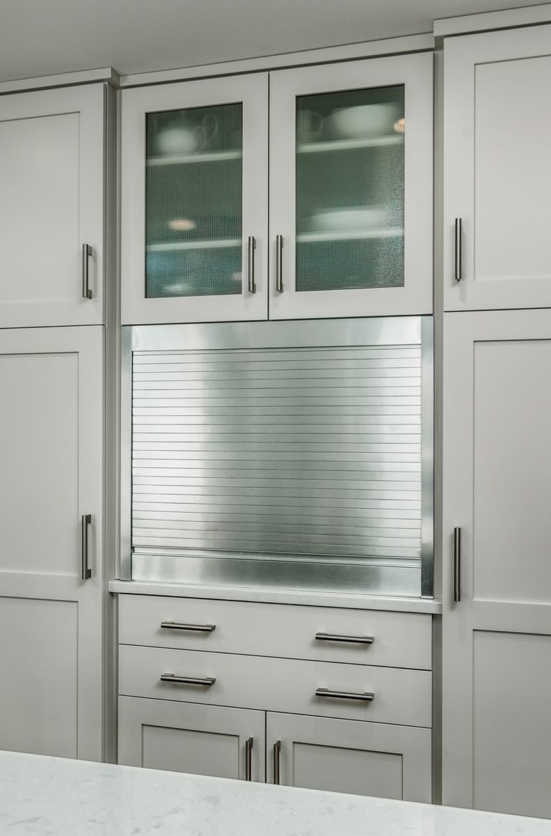 Kitchen counter nook with closed metal shutter