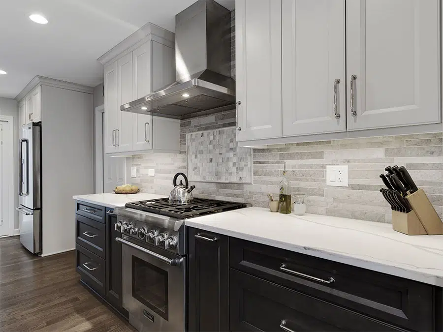 Modern kitchen with cabinets, drawers, refrigerator, oven and stovetop