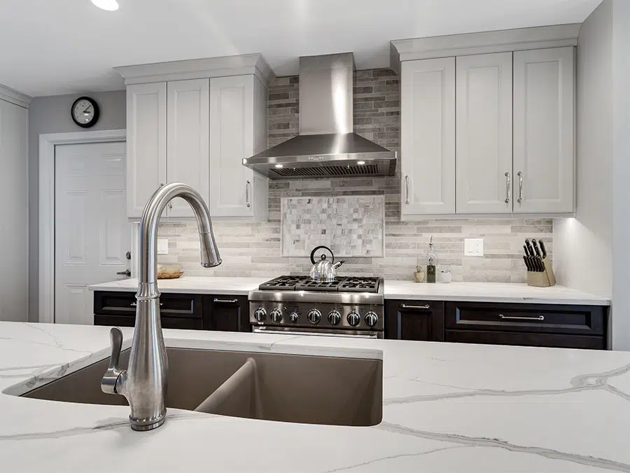 the kitchen master remodel white cabinets quartz countertops chrome finishes gas range