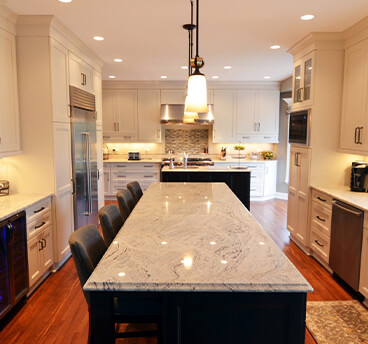contemporary galley kitchen remodel stone island 4 barstools white cabinets